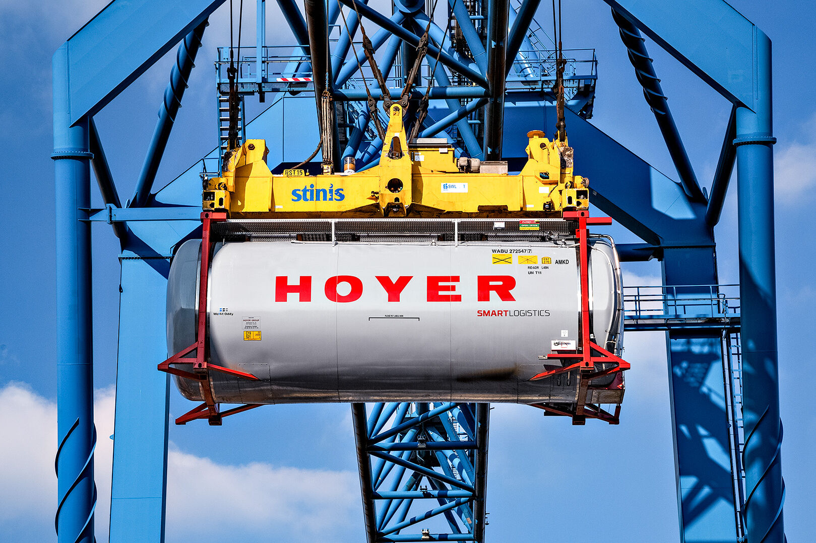 HOYER chemical tank container smart logistics on a crane