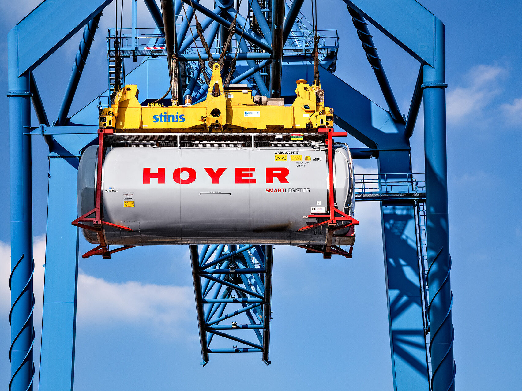 HOYER chemical tank container smart logistics on a crane