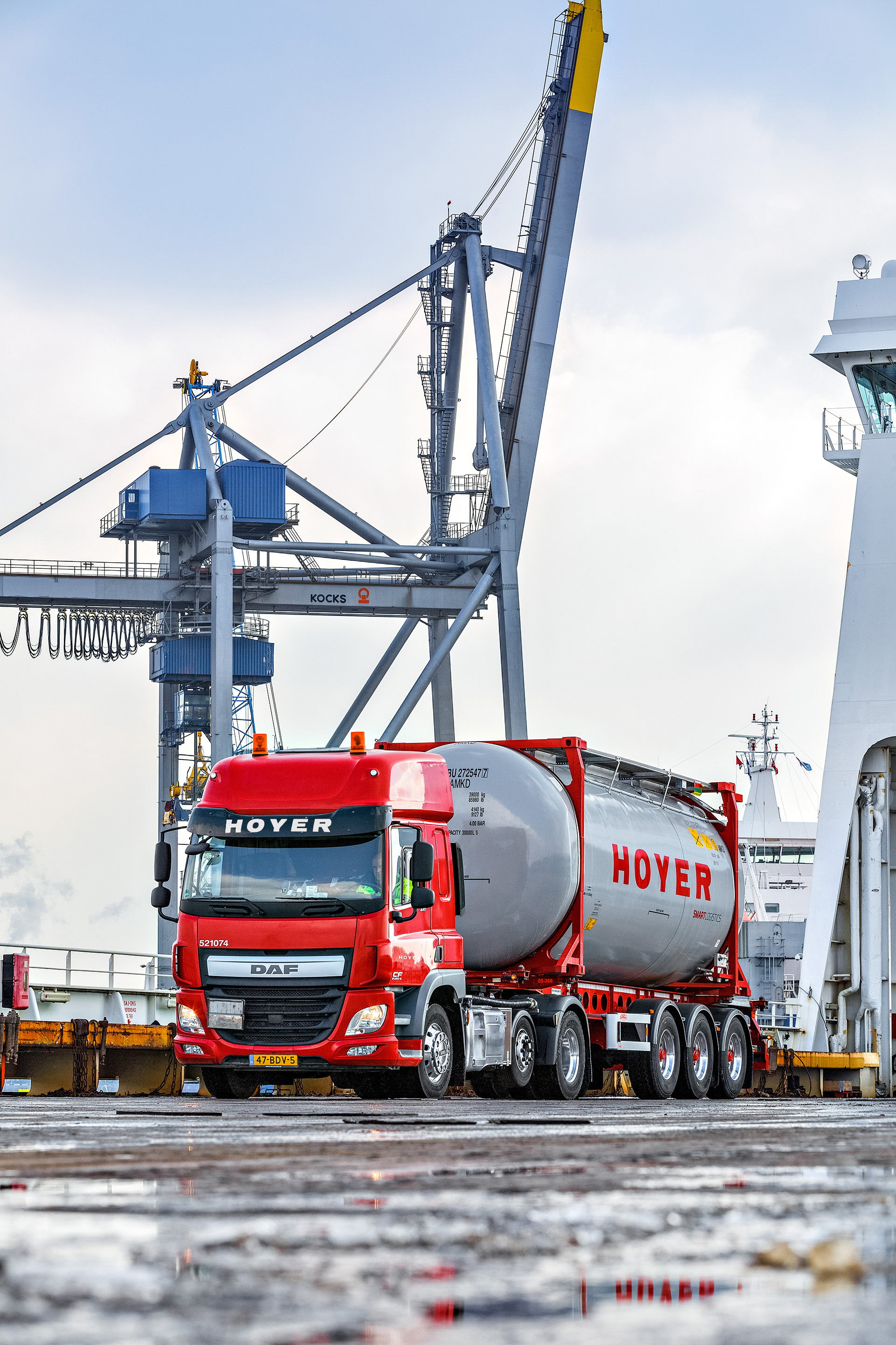 HOYER truck with smart logistics tank container at the harbour in Rotterdam