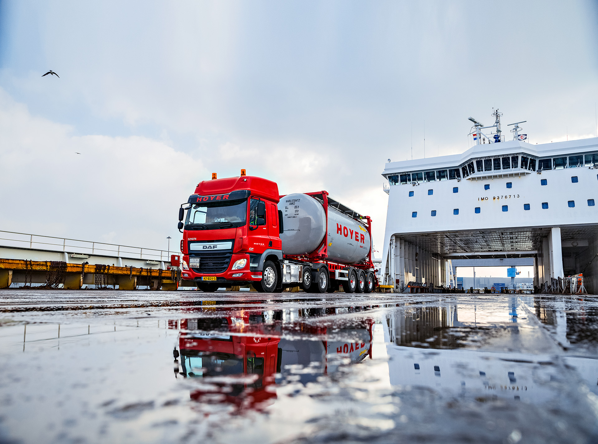 HOYER truck with tankcontainer with chemicals at the harbour in Rotterdam